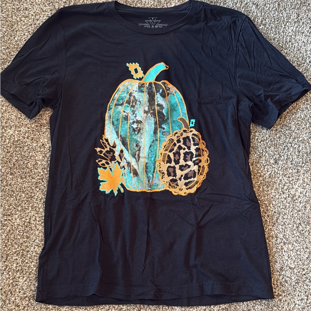 Crazy Train Black Tee with Turquoise and Orange Pumpkin Design